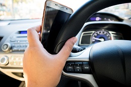 You are your family may be put in peril if another driver is distracted behind the wheel