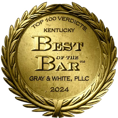 Logo Recognizing Gray and White Law's affiliation with award-medallion