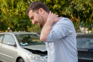 Neck pain after a traffic collision can be a sign of a serious injury