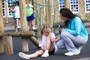 Young girl is hurt in a fall at her day care playground