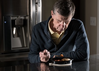 A nursing home resident is not enjoying the food he has been given