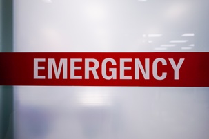 emergency sign on glass door