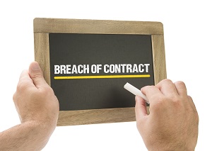 Breach of contract is recorded in chalk on a blackboard