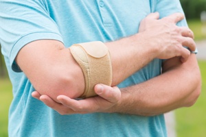 bursitis caused by car accident Gray and White Law