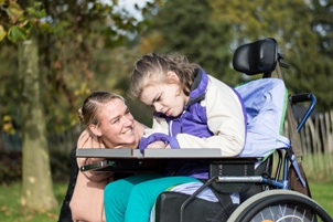 child in wheelchair with cerebral palsy