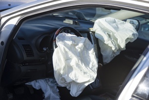 driver and passenger airbags deployed in car crash