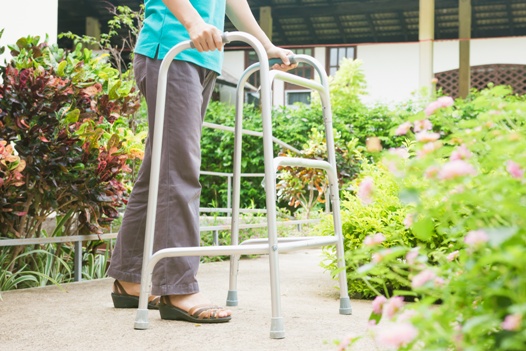 elderly person using walker