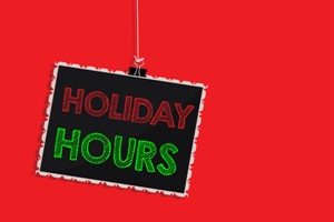 holiday hours hanging sign