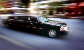 limo speeding down a city street