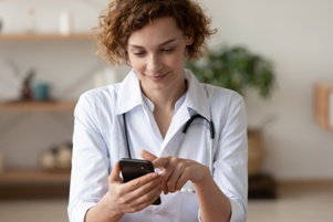 nursing home worker using cell phone