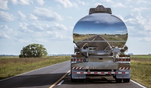 rear view of a tanker truck on the highway