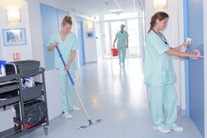 staff cleaning and repairing nursing home