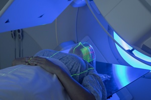 woman receiving radiation treatment