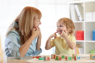 young child getting speech therapy